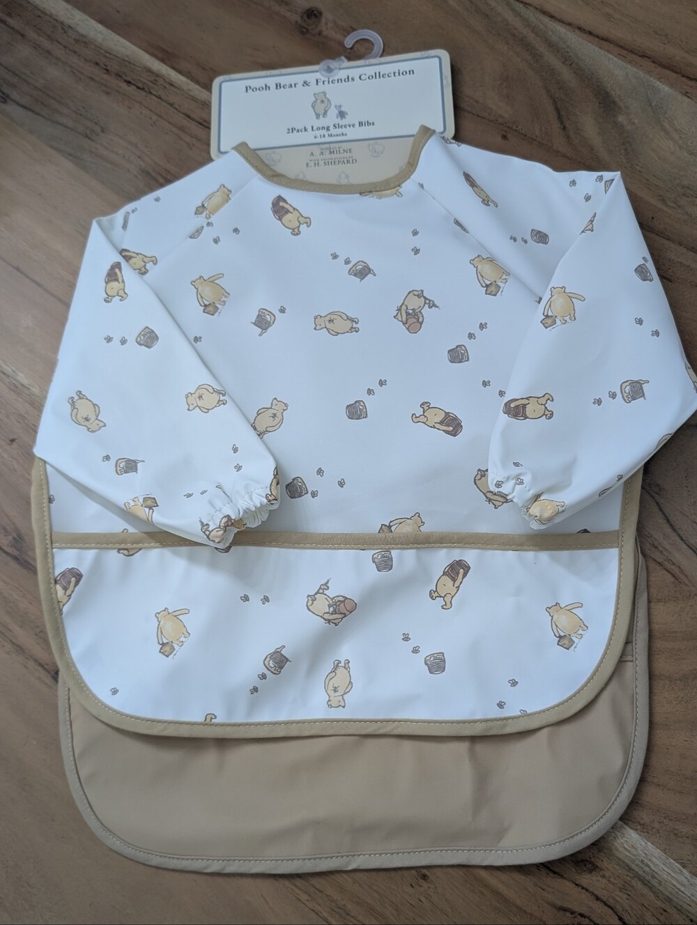 brand new Pooh Bear & Friends Long Sleeve Bibs